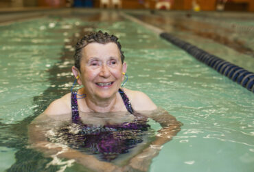 Public Swimming Pool,USA,An elderly woman in a swimming pool.