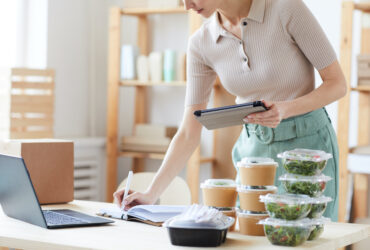 Woman working in food delivery service